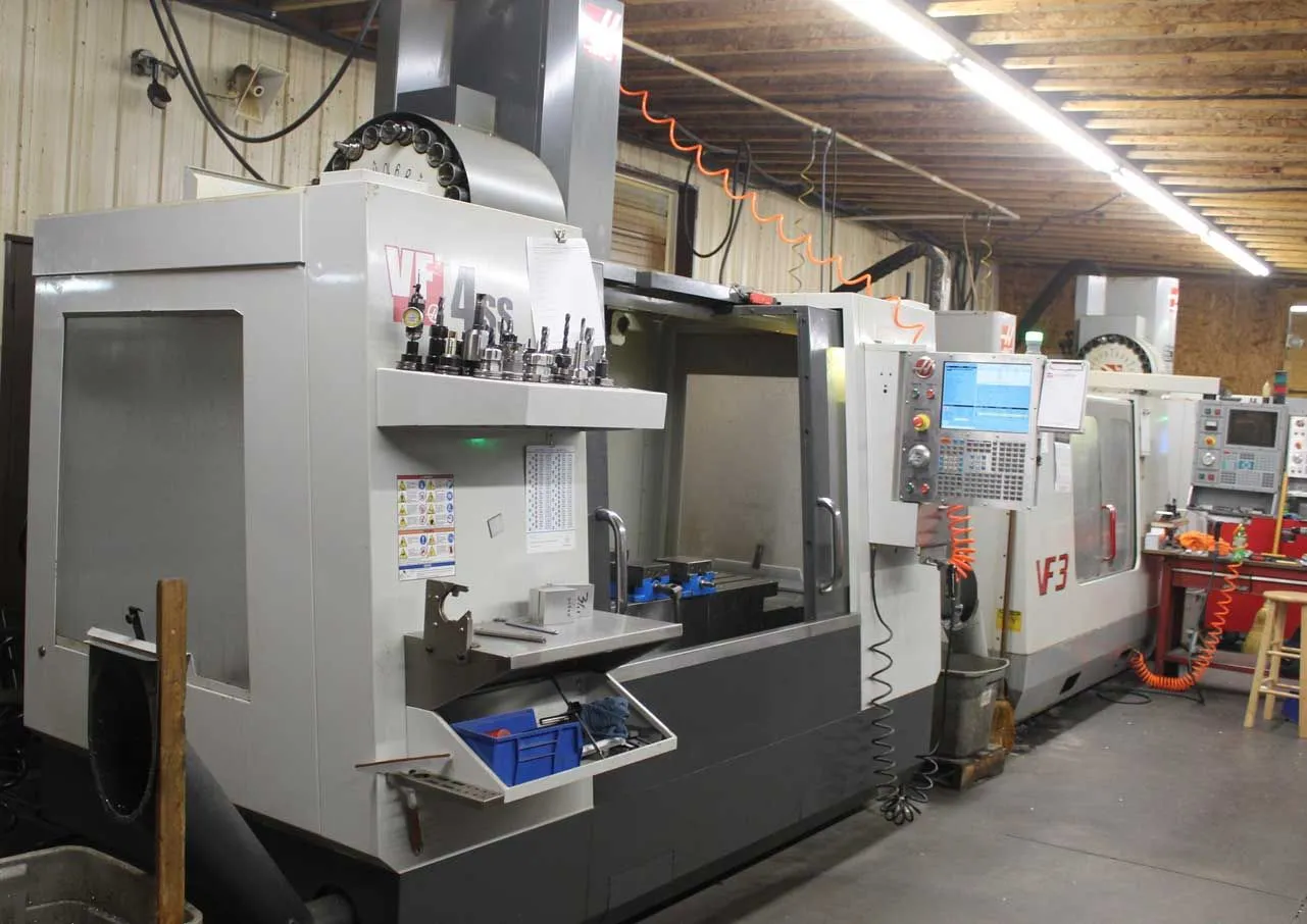 CNC mill cutting a metal part