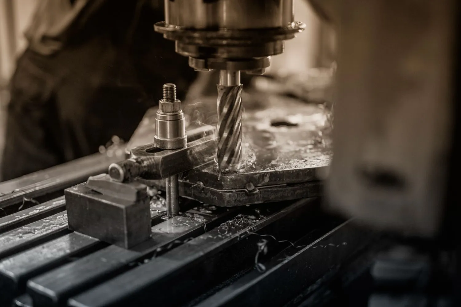 Industrial machine drilling metal