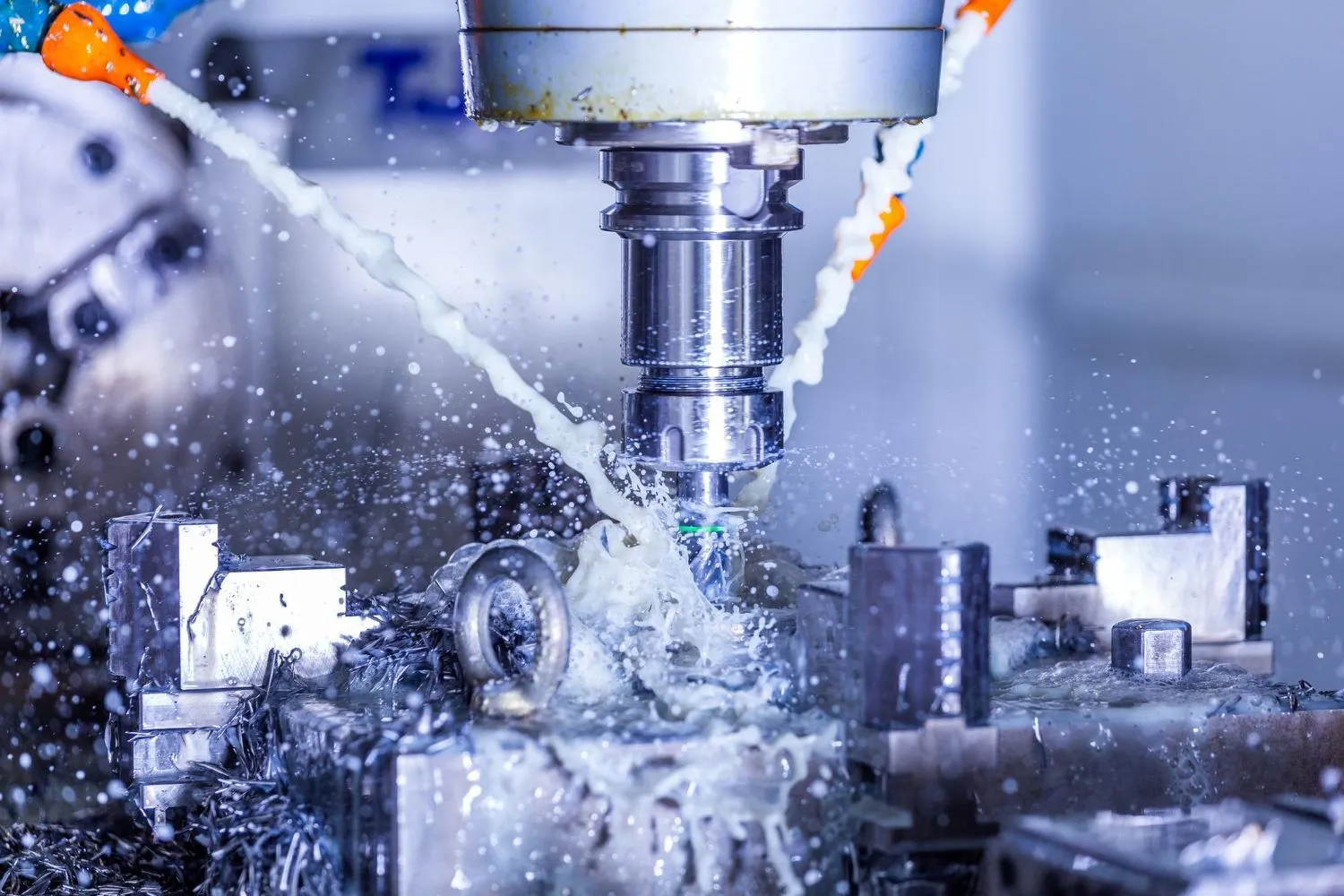 Vertical CNC steel milling process with external water coolant streams