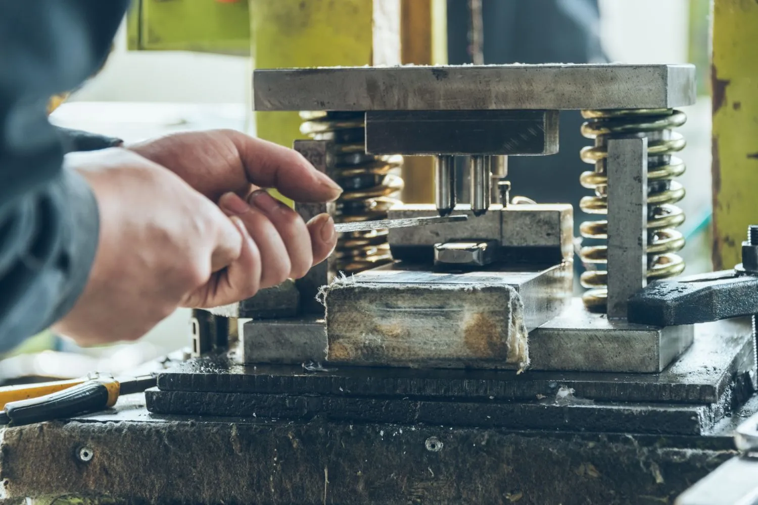 Machinists operating machines on the shop floor